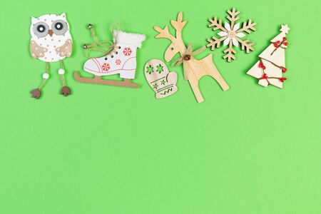 Top view of holiday ornament made of Christmas decorations on colorful background. New Year time concept with copy space.の写真素材