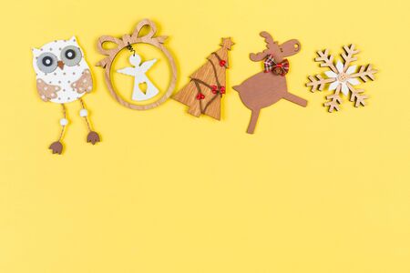 Top view Christmas toys and decorations on colorful background. New Year holiday concept with copy space.の写真素材