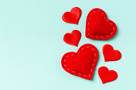 Top view of red hearts on colorful background with copy space. Romantic concept. Valentine's day...