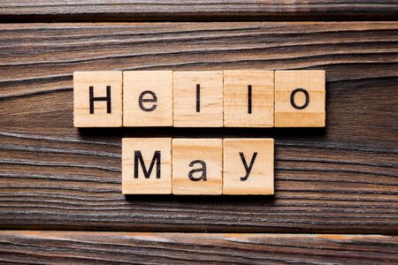 Hello May word written on wood block. Hello May text on table, concept.の写真素材