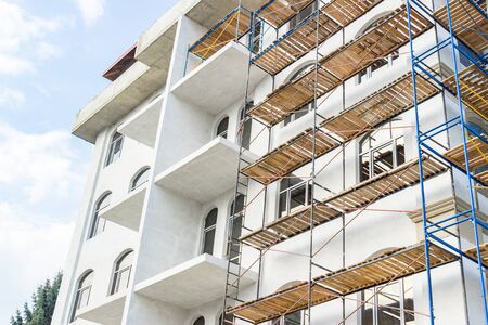 Extensive scaffolding for building a new house. Constraction of platforms for building works.の写真素材