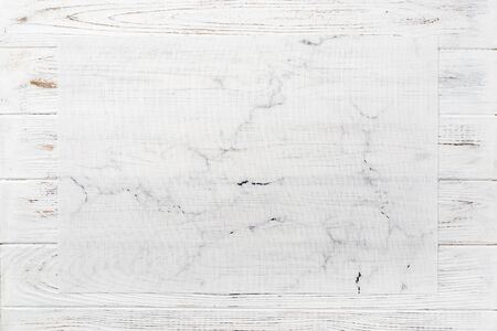 Top view of textile white mat for dinner on wooden background with copy space.の写真素材