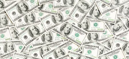 Top view of American money background. Pile of dollar cash. Paper banknotes concept.