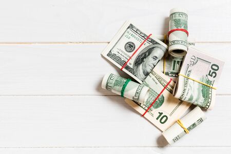 US Dollar bills bundles stack. one hundred dollar bills with stack of money in the middle. Top view...