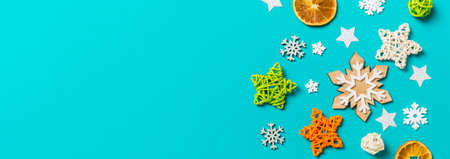 Banner top view of blue background with New Year toys and decorations. Christmas time concept with copy space.の写真素材