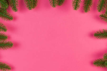 Top view of colorful festive background made of fir tree branch. Christmas holiday concept with copy space.の写真素材