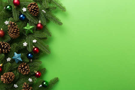 Christmas background with fir branches and Christmas decor. Top view, copy space for text.の写真素材