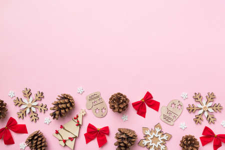 New Year composition. Christmas decor background with pine cones. Top view with copy space.の写真素材