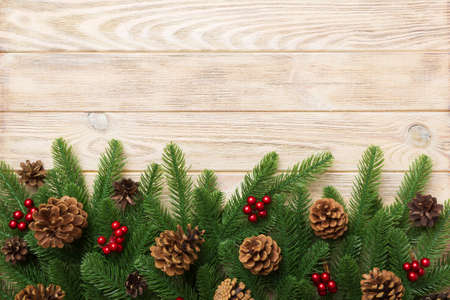 Christmas background with fir branches and Christmas decor. Top view, copy space for text.