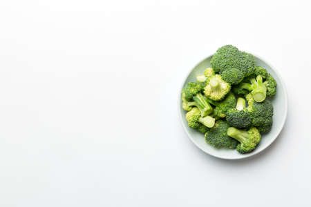 broccoli of fresh green broccoli in bowl over coloredbackground. , close up. Fresh vegetable.の写真素材
