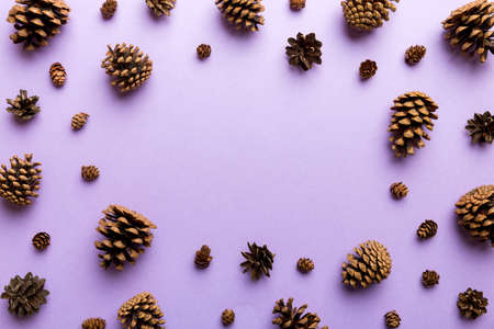 minimal creative cone frame arrangement pattern on colored background. flat lay, top view. christmas background with copy space.の写真素材