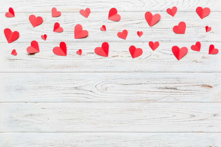 Valentine day background with red hearts, top view with copy space.の写真素材
