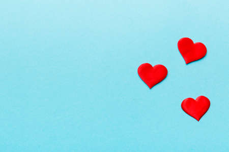 Valentine day background with red hearts, top view with copy space.の写真素材