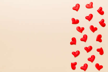 Valentine day background with red hearts, top view with copy space.の写真素材