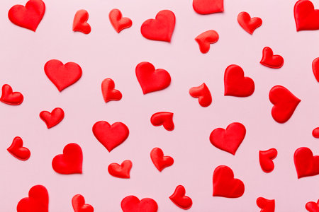 Valentine day background with red hearts, top view with copy space.の写真素材
