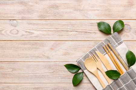 Eco friendly reusable recyclable white eco bag with kitchenware on Colored background. Concept zero waste.の写真素材