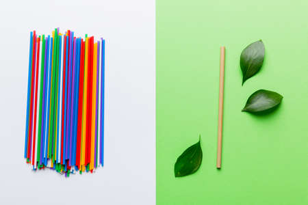 Eco friendly alternative to plastic drink cans. Choice between plastic vs bamboo. Top view Aluminum and Plastic Drinking Straw.の写真素材