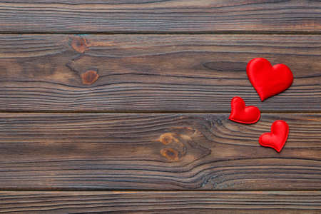Valentine day background with red hearts, top view with copy space.の写真素材