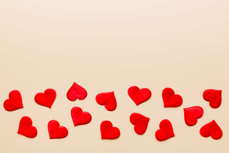 Valentine day background with red hearts, top view with copy space.の写真素材