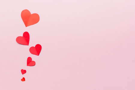 Valentine day background with red hearts, top view with copy space.の写真素材