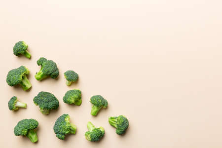 Broccoli scattered on white wooden table.copy space.Top viewの写真素材