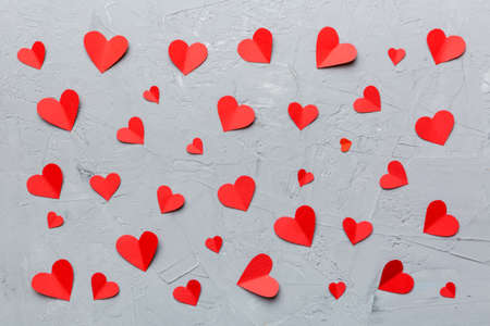 Valentine day background with red hearts, top view with copy space.の写真素材