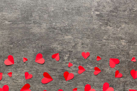 Valentine day background with red hearts, top view with copy space.の写真素材