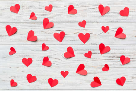 Valentine day background with red hearts, top view with copy space.