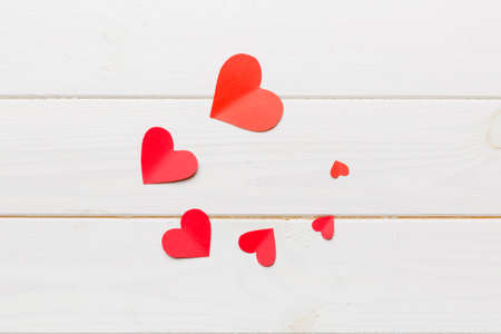 Valentine day background with red hearts, top view with copy space.