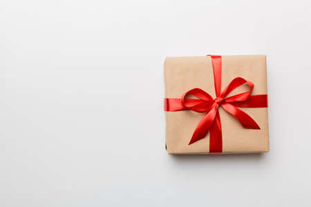 Holiday present box over colored background, top view. Copy space for design.の写真素材
