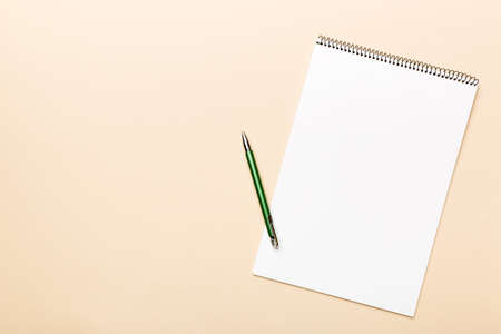 Blank notebook with pen on white background. Back to school and education concept.