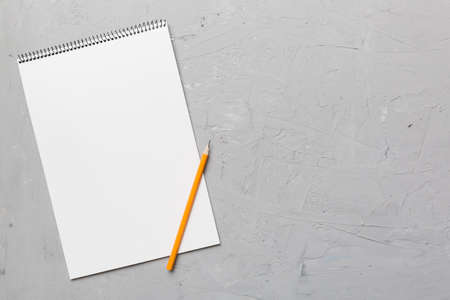 Blank notebook with pen on white background. Back to school and education concept.の写真素材