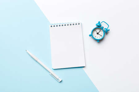 Blank notebook with pen on white background. Back to school and education concept.の写真素材