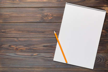 Blank notebook with pen on white background. Back to school and education concept.の写真素材