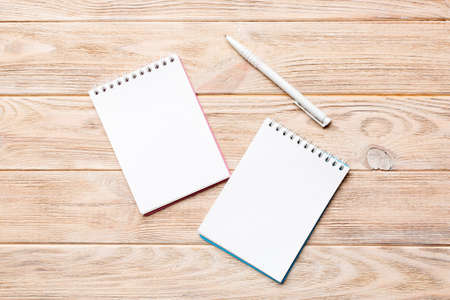 Blank notebook with pen on white background. Back to school and education concept.