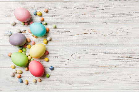 holiday preparation Multi colors Easter eggs on colored background . Pastel color Easter eggs. holiday concept with copy space.の写真素材