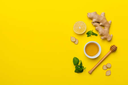 Natural cold and flu home remedies. Natural ingredients for immunity stimulation and viruses protection. top view flat lay.の写真素材