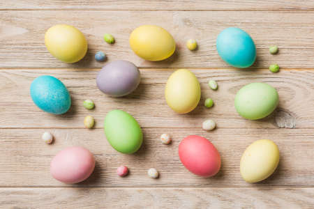 holiday preparation Multi colors Easter eggs on colored background . Pastel color Easter eggs. holiday concept with copy space.の写真素材