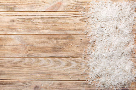 Background from white sea salt. Coarse rock salt texture witth copy space.の写真素材