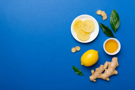 Natural cold and flu home remedies. Natural ingredients for immunity stimulation and viruses protection. top view flat lay.の写真素材