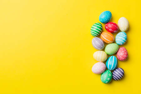 holiday preparation Multi colors Easter eggs on colored background . Pastel color Easter eggs. holiday concept with copy space.の写真素材