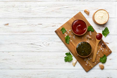 Many different sauces and herbs on table, flat lay top view. sauces on plate, healthy concept.の写真素材