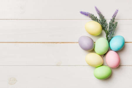 holiday preparation Multi colors Easter eggs on colored background . Pastel color Easter eggs....