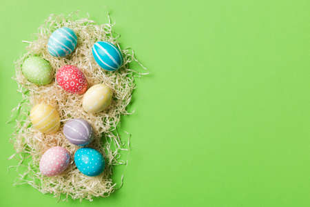 holiday preparation Multi colors Easter eggs on colored background . Pastel color Easter eggs. holiday concept with copy space.の写真素材