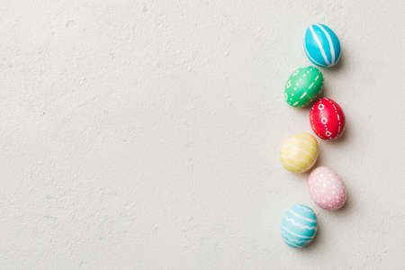 holiday preparation Multi colors Easter eggs on colored background . Pastel color Easter eggs. holiday concept with copy space.の写真素材