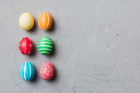 holiday preparation Multi colors Easter eggs on colored background . Pastel color Easter eggs. holiday concept with copy space.の写真素材