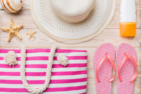 Summer vacation concept flat lay. beach accessories and towel top view. Space for text. travel concept.の写真素材