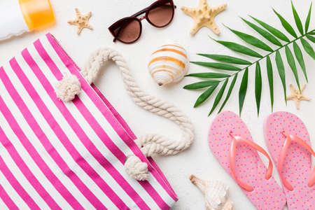 Summer vacation concept flat lay. beach accessories and towel top view. Space for text. travel concept.の写真素材