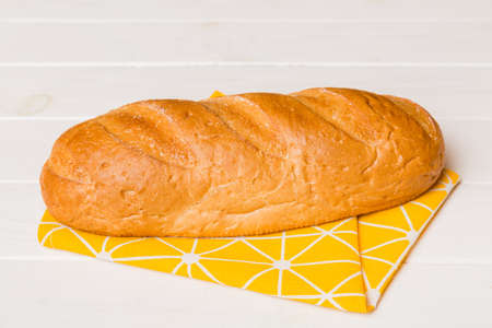 Fresh homemade crispbread on napkin, top view. Healthy unleavened bread. French bread. Top view...