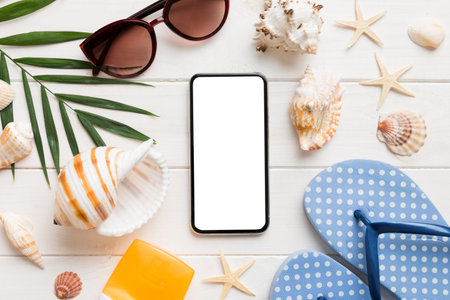 Flat lay composition with Phone and beach accessories on colored background. Smartphone with blank...